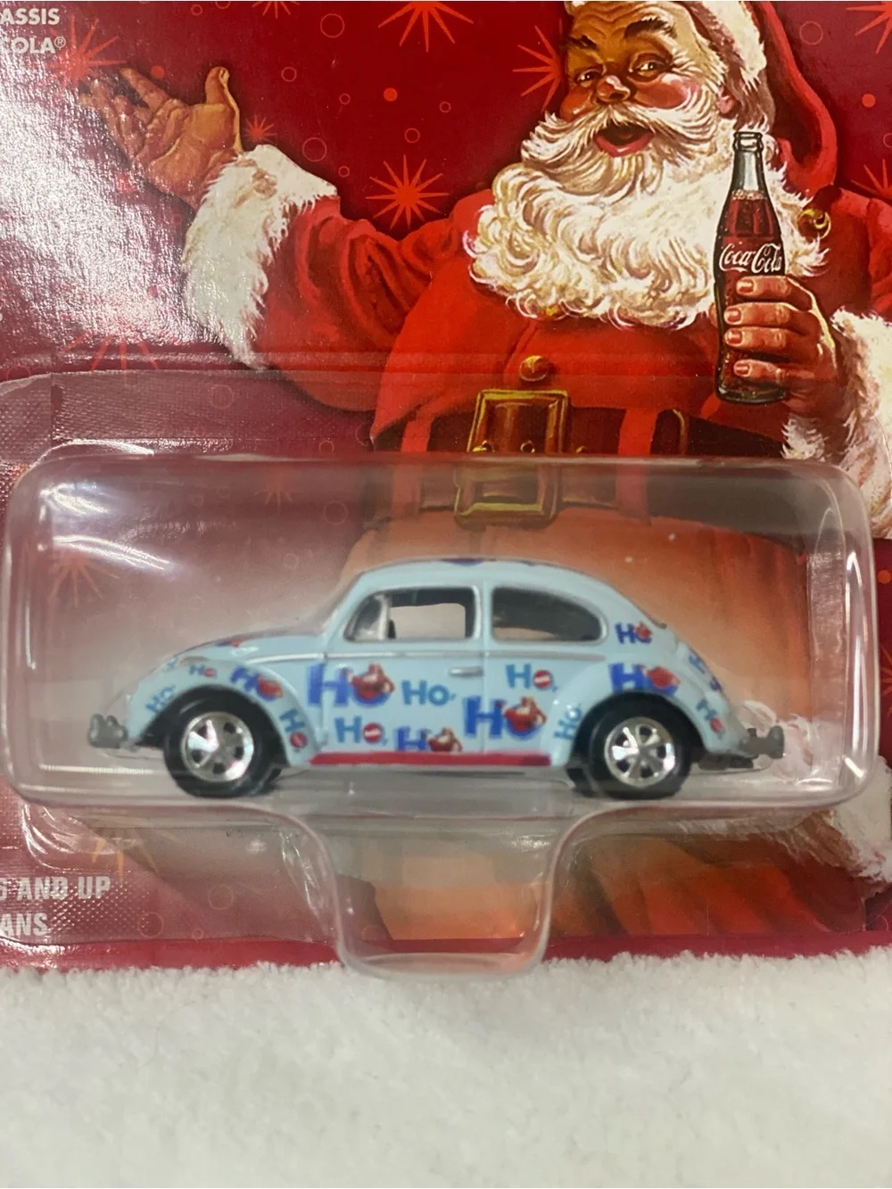Johnny Lightning Die Cast 1965 Volkswagen Beetle Coca Cola Brand Ho Ho Ho on Car